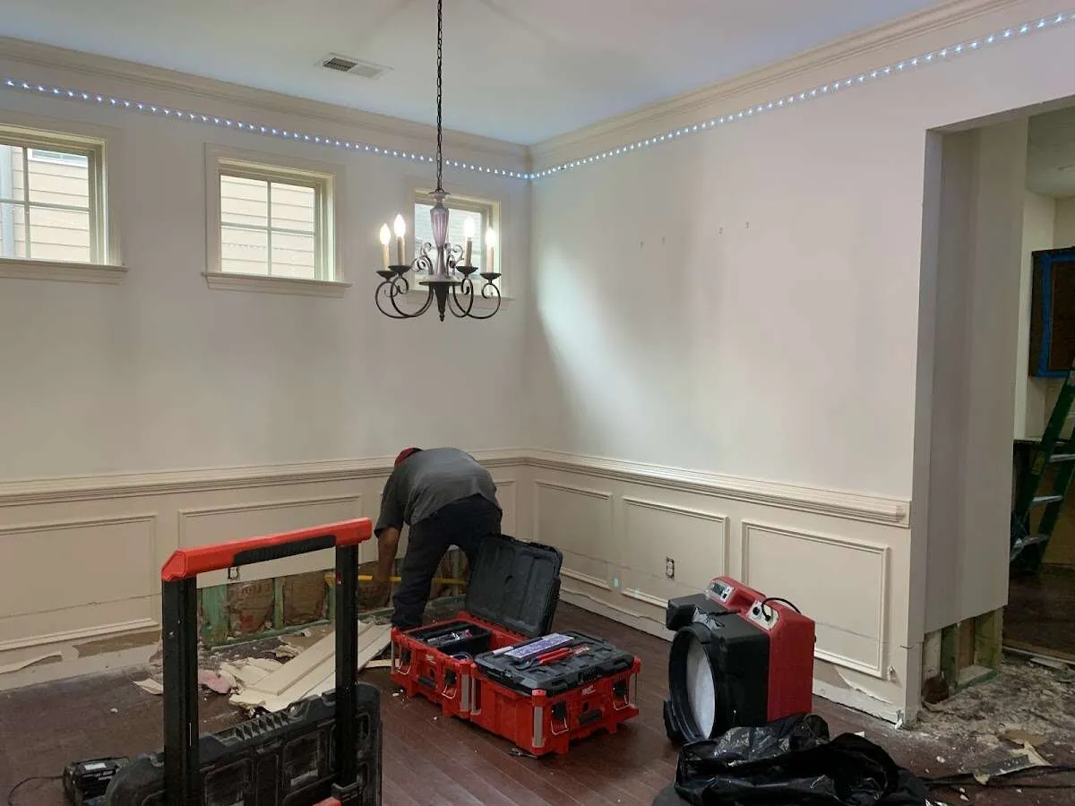 Restoration technician with professional equipment in Woodbury